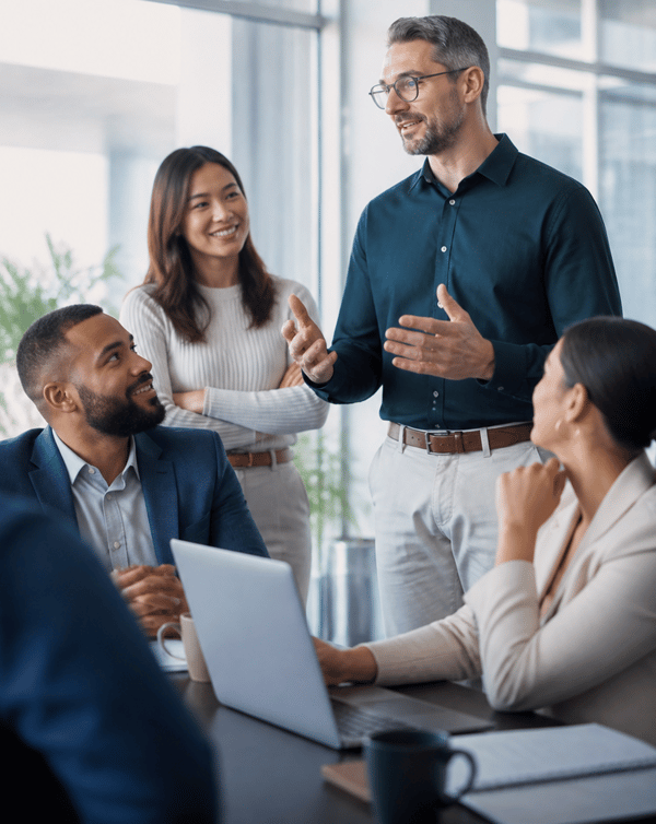 Corporate Manager Explaining to Diverse Team-1-1 Corporate Manager Explaining to Diverse Team-1-1